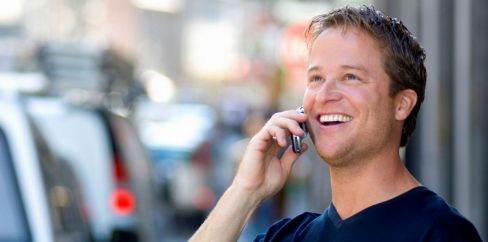 Man calling for emergency towing services in Docklands